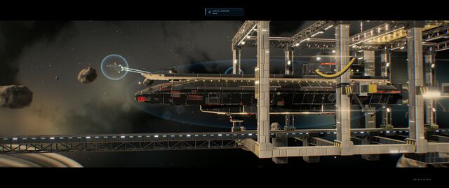 The capital ship sliding out of a long orbital dock (full size, 1920 × 804)