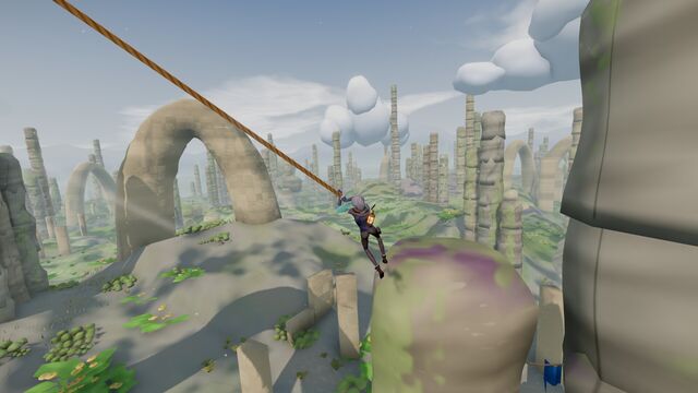 Swinging below a stone arch among ruined columns